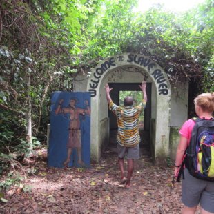 Notice the now broken chains on the man painted on the door.