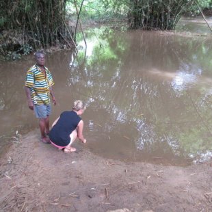 Touching the water of Slave River. Behind the bamboos tress in the right of this image is 
