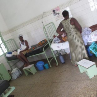 Another Mat. room. The buckets on the ground are what the women use for a rest room.