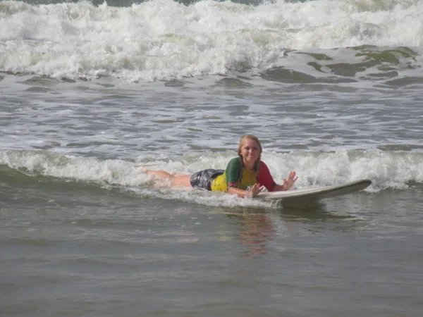 Charli mastering her body boarding
